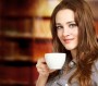 Young Woman Enjoying a Hot Beverage